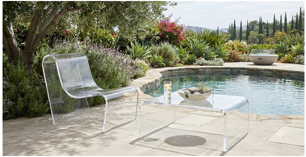 Outdoor acrylic furniture by a luxury pool, premium PMMA lounge chairs and tables in a high-end resort setting, bright natural light